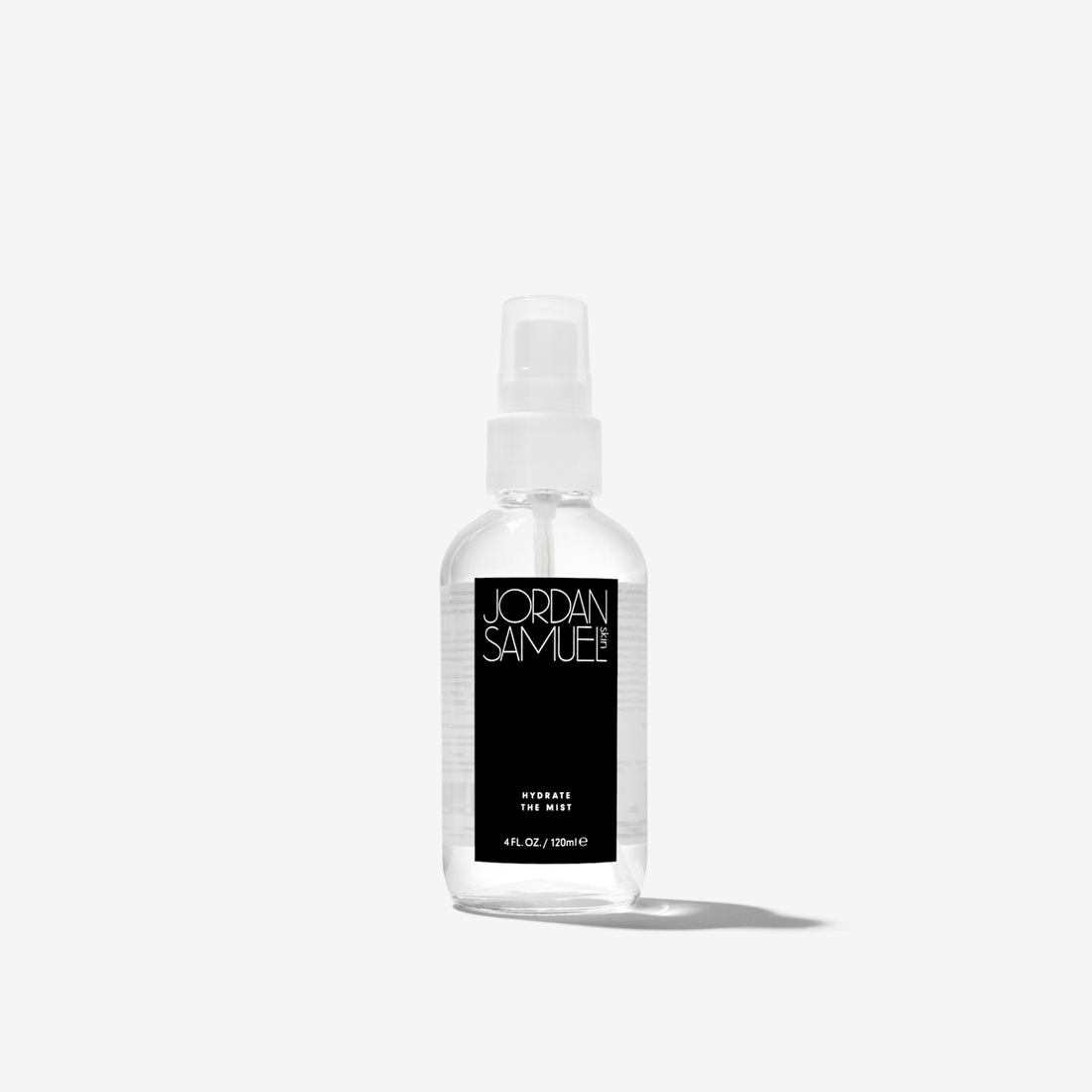 Hydrate the Mist product photo - Clear glass spray bottle with black label on a white background