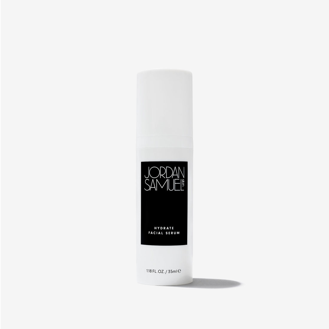 Hydrate Facial Serum product image - White skincare pump bottle with black label on a white background