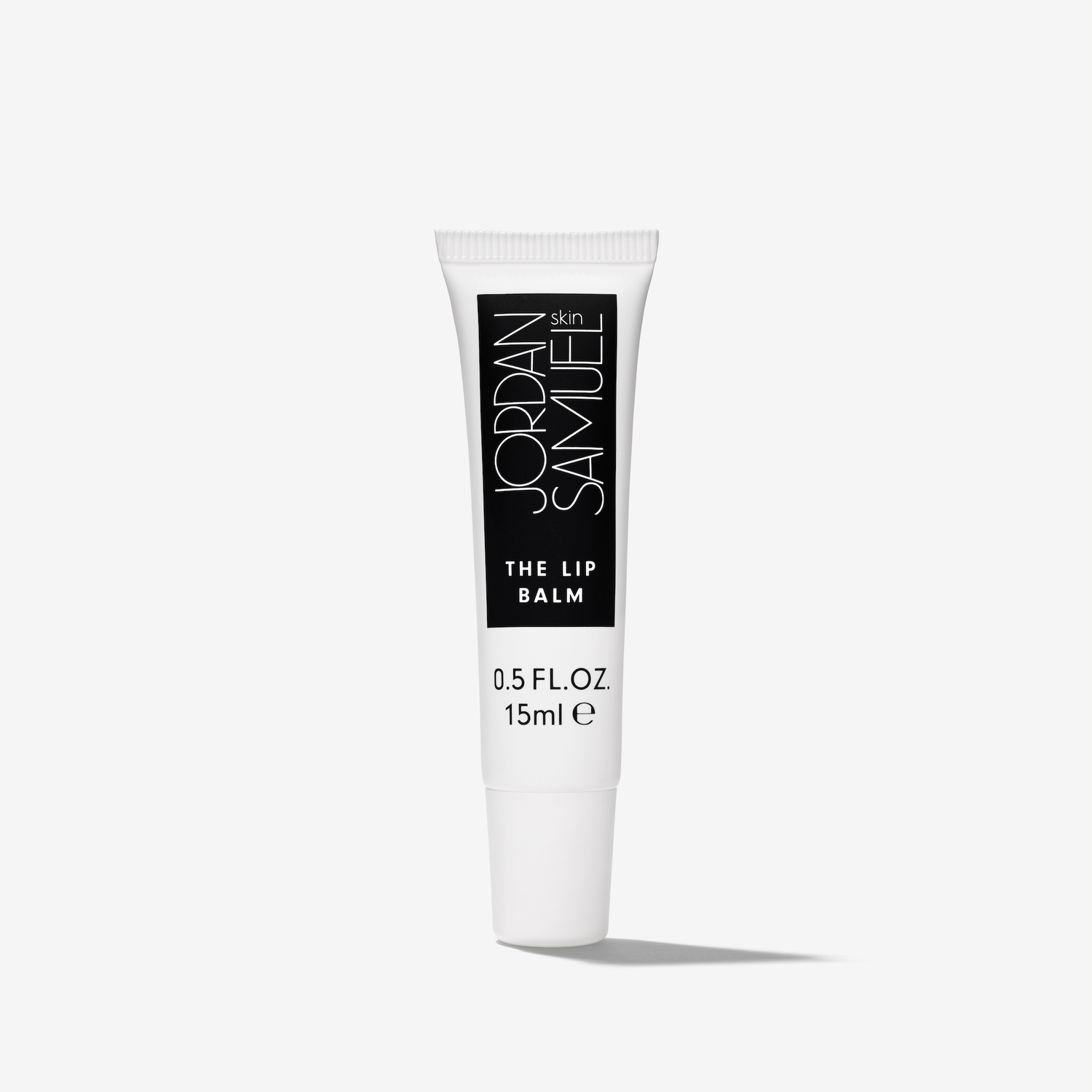 Jordan Samuel The Lip Balm tube on a white background