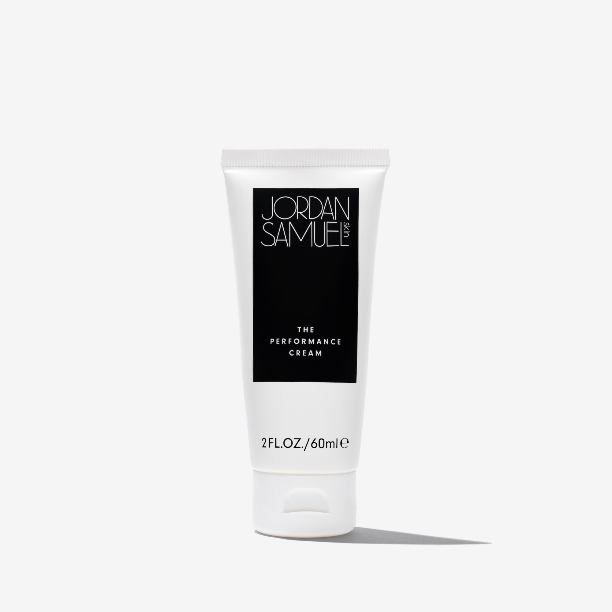 The Performance Cream product image - White cream tube with black label on a white background