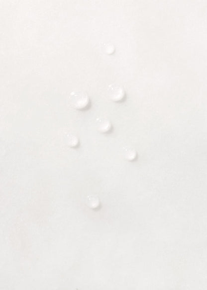 Drops of translucent Hydrate The Mist on white background.